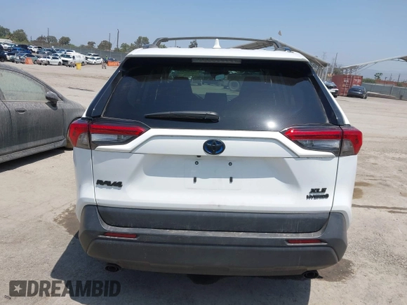 2022 Toyota RAV4 Hybrid XLE with VIN 2T3RWRFV9NW130472, listed as a IAAI auction lot 40990707 with 156,174 mi miles and . Bid and sale history available at DreamBid. Image 16.