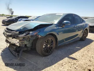 2025 Toyota Camry LE with VIN 4T1DAACKXSU060098, listed as a Copart auction lot 49723885 with 6,934 mi miles and Salvage Title. Bid and sale history available at carsss.com. Image 1.