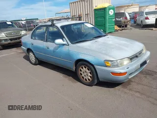 1994 Toyota Corolla with VIN JT2AE00B9R0050716, listed as a IAAI auction lot 42597023 with 110,637 mi miles and . Bid and sale history available at DreamBid. Image 1.