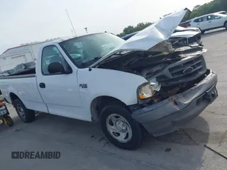 2004 Ford F-150 XL z VIN 2FTRF17254CA24554, wystawiony jako IAAI lot #42069797 z przebiegiem 278 572 mil mil oraz . Historia ofert i sprzedaży dostępna na DreamBid. Obrazek 13.