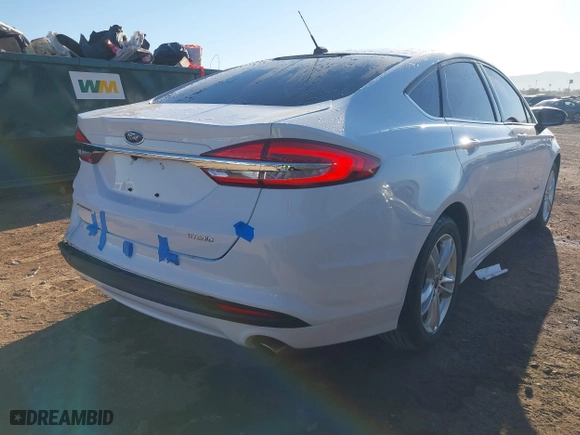 2018 Ford Fusion Hybrid S with VIN 3FA6P0UU0JR204324, listed as a IAAI auction lot 41312303 with 100,527 mi miles. Bid and sale history available at carsss.com. Image 4.