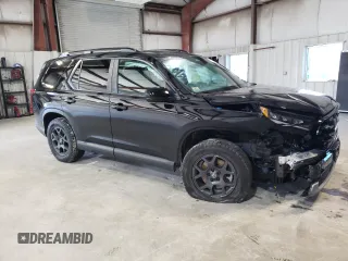 2023 Honda Pilot TrailSport with VIN 5FNYG1H63PB031249, listed as a Copart auction lot 85163934 with 12,058 mi miles and Salvage Title. Bid and sale history available at carsss.com. Image 4.