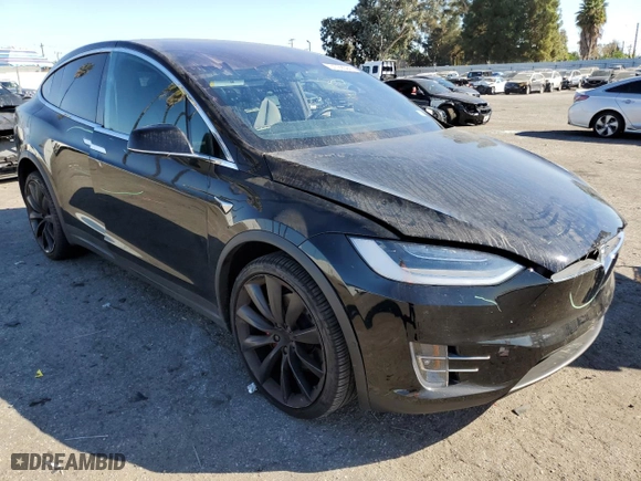 2019 Tesla Model X P100D with VIN 5YJXCBE46KF185298, listed as a Copart auction lot 74799084 with NaN miles and Salvage Title. Bid and sale history available at carsss.com. Image 4.