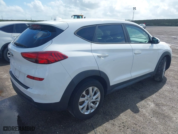 2019 Hyundai Tucson SE with VIN KM8J23A46KU048921, listed as a IAAI auction lot 40781586 with 57,186 mi miles. Bid and sale history available at carsss.com. Image 4.