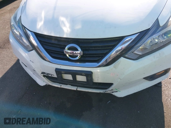 2018 Nissan Altima 2.5 S with VIN 1N4AL3AP8JC254733, listed as a IAAI auction lot 40212001 with 148,347 mi miles. Bid and sale history available at carsss.com. Image 13.
