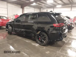 2017 Jeep Grand Cherokee SRT with VIN 1C4RJFDJ9HC739324, listed as a IAAI auction lot 40898998 with 92,547 mi miles. Bid and sale history available at carsss.com. Image 3.