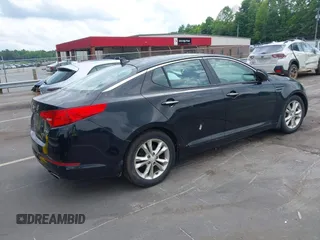 2012 Kia Optima EX z VIN 5XXGN4A78CG035729, wystawiony jako IAAI lot #42394149 z przebiegiem 158 557 mil mil oraz . Historia ofert i sprzedaży dostępna na DreamBid. Obrazek 4.