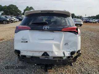 2016 Toyota RAV4 SE with VIN JTMJFREV5GD184074, listed as a Copart auction lot 60116955 with 182,240 mi miles and Salvage title. Bid and sale history available at DreamBid. Image 6.