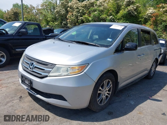 2011 Honda Odyssey EX-L with VIN 5FNRL5H62BB075789, listed as a IAAI auction lot 42035746 with 238,616 mi miles and . Bid and sale history available at carsss.com. Image 17.