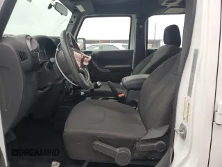 2018 Jeep Wrangler JK Unlimited Sport S with VIN 1C4BJWDG7JL865323, listed as a Copart auction lot 79419474 with 15,408 mi miles and Salvage Title. Bid and sale history available at carsss.com. Image 7.