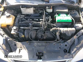 2007 Ford Focus S with VIN 1FAHP31N67W294415, listed as a IAAI auction lot 41783050 with 143,876 mi miles and . Bid and sale history available at DreamBid. Image 10.