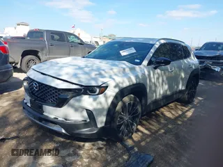 2024 Mazda CX-50 Premium z VIN 7MMVABDY3RN207237, wystawiony jako IAAI lot #41044580 z przebiegiem 3381 mil mil oraz . Historia ofert i sprzedaży dostępna na DreamBid. Obrazek 2.