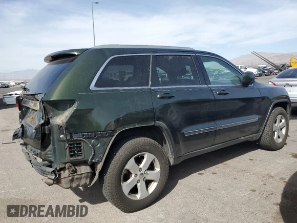 2011 Jeep Grand Cherokee Laredo with VIN 1J4RR4GG2BC636423, listed as a Copart auction lot 51169135 with 143,058 mi miles and Salvage Title. Bid and sale history available at DreamBid. Image 3.