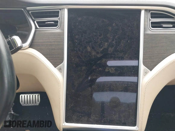 2014 Tesla Model S 60 with VIN 5YJSA1H10EFP34137, listed as a IAAI auction lot 42311565 with Not provided miles and . Bid and sale history available at DreamBid. Image 16.