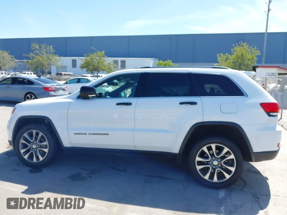 2018 Jeep Grand Cherokee Limited with VIN 1C4RJFBG3JC245943, listed as a IAAI auction lot 42287279 with 107,719 mi miles and . Bid and sale history available at DreamBid. Image 14.