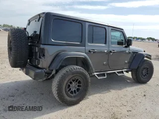 2023 Jeep Wrangler Willys with VIN 1C4HJXDGXPW526093, listed as a Copart auction lot 56818935 with 24,021 mi miles and Salvage title. Bid and sale history available at DreamBid. Image 3.