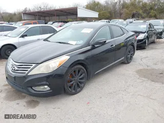 2012 Hyundai Azera with VIN KMHFH4JG4CA149544, listed as a IAAI auction lot 41499854 with 157,302 mi miles. Bid and sale history available at carsss.com. Image 2.