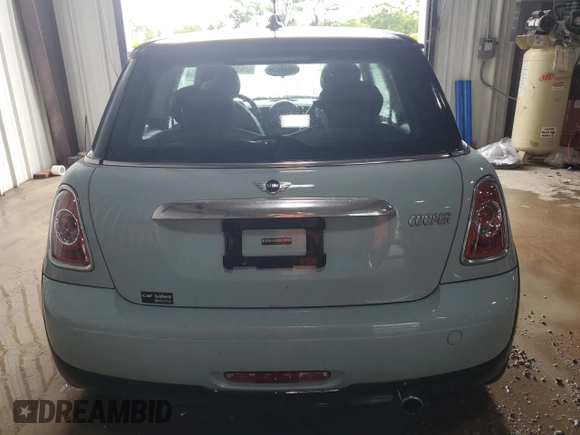 2012 MINI Hardtop with VIN WMWSU3C55CT541969, listed as a Copart auction lot 60988325 with 44,770 mi miles and Salvage title. Bid and sale history available at DreamBid. Image 6.