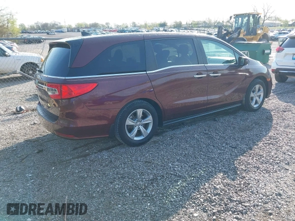 2019 Honda Odyssey EX-L z VIN 5FNRL6H75KB116656, wystawiony jako IAAI lot #41870961 z przebiegiem 87 697 mil mil oraz . Historia ofert i sprzedaży dostępna na DreamBid. Obrazek 4.