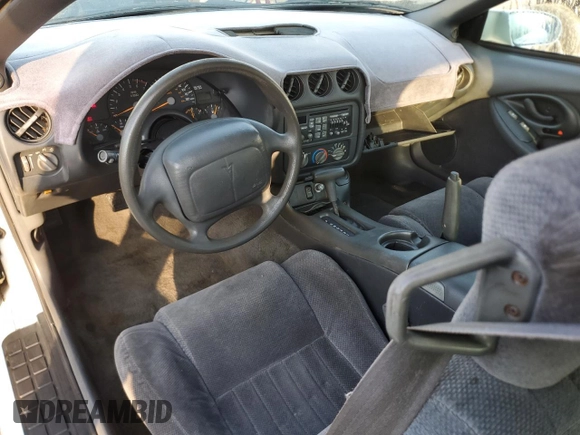 1997 Pontiac Firebird Firebird z VIN 2G2FS22K5V2232134, wystawiony jako Copart lot #47107645 z przebiegiem Nie podano mil oraz Szkoda całkowita • Salvage title. Historia ofert i sprzedaży dostępna na DreamBid. Obrazek 8.