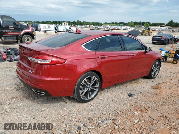 2020 Ford Fusion Titanium with VIN 3FA6P0K91LR180973, listed as a Copart auction lot 60023215 with 26,615 mi miles and Salvage title. Bid and sale history available at DreamBid. Image 3.