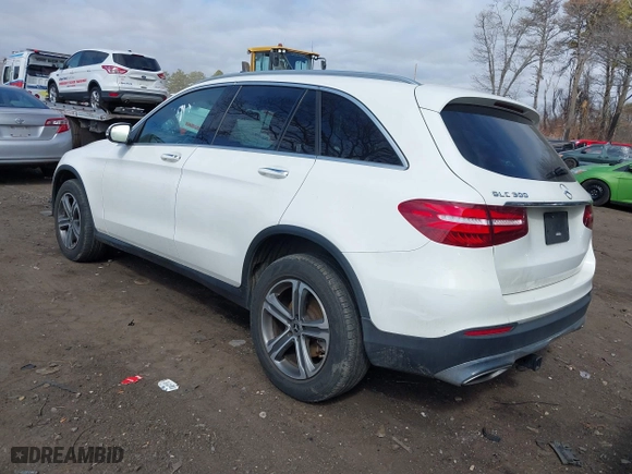 2019 Mercedes-Benz GLC with VIN WDC0G4KB3K1005332, listed as a IAAI auction lot 41774506 with 73,934 mi miles. Bid and sale history available at carsss.com. Image 3.