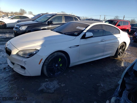 2015 BMW 6 Series 650i xDrive with VIN WBA6B4C51FD761301, listed as a Copart auction lot 42350655 with 0 mi miles and Salvage Title. Bid and sale history available at carsss.com. Image 1.