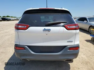 2015 Jeep Cherokee Latitude with VIN 1C4PJLCSXFW643701, listed as a Copart auction lot 51322805 with 67,415 mi miles and Salvage Title. Bid and sale history available at carsss.com. Image 6.