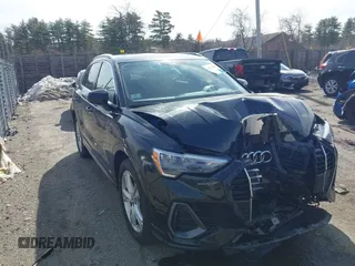 2020 Audi Q3 S line Premium z VIN WA1DECF31L1030946, wystawiony jako IAAI lot #41774297 z przebiegiem 58 548 mil mil oraz . Historia ofert i sprzedaży dostępna na DreamBid. Obrazek 13.