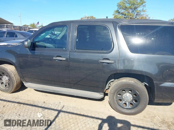 2013 Chevrolet Tahoe Commercial with VIN 1GNLC2E05DR266048, listed as a IAAI auction lot 40848505 with 95,459 mi miles and . Bid and sale history available at DreamBid. Image 14.