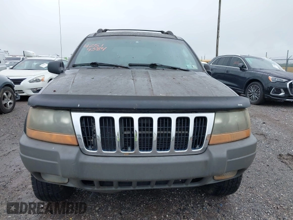 2002 Jeep Grand Cherokee with VIN 1J4GW38N62C190851, listed as a IAAI auction lot 42519384 with 142,066 mi miles and . Bid and sale history available at DreamBid. Image 6.