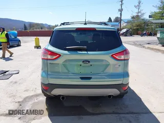 2013 Ford Escape SE with VIN 1FMCU9GX3DUB21947, listed as a IAAI auction lot 42005620 with 155,369 mi miles. Bid and sale history available at carsss.com. Image 16.