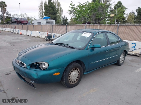 1996 Mercury Sable LS with VIN 1MELM53S0TG600877, listed as a IAAI auction lot 42063937 with 200,405 mi miles. Bid and sale history available at carsss.com. Image 6.