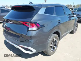 2023 Kia Sportage EX with VIN KNDPVCAG8P7019572, listed as a IAAI auction lot 42226335 with 68,583 mi miles and . Bid and sale history available at DreamBid. Image 4.
