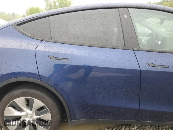 2022 Tesla Model Y Long Range z VIN 7SAYGDEE6NF318808, wystawiony jako Copart lot #57219915 z przebiegiem Nie podano mil oraz Szkoda całkowita • Salvage title. Historia ofert i sprzedaży dostępna na DreamBid. Obrazek 10.