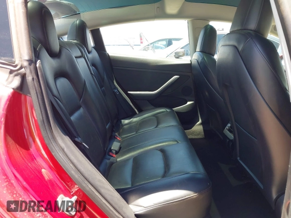 2023 Tesla Model 3 z VIN 5YJ3E1EA4PF454981, wystawiony jako IAAI lot #42704135 z przebiegiem 93 008 mil mil oraz . Historia ofert i sprzedaży dostępna na DreamBid. Obrazek 8.