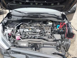 2023 Toyota Corolla Cross Hybrid S with VIN 7MUFBABG6PV010999, listed as a IAAI auction lot 41489541 with 14,707 mi miles and . Bid and sale history available at DreamBid. Image 10.