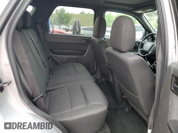 2011 Ford Escape XLT с VIN 1FMCU9DG8BKC62302, выставлен на аукционе Copart как лот 58240715 с пробегом 159 739 миль миль и Списание • Salvage title. История ставок и продаж доступна на DreamBid. Изображение 11.