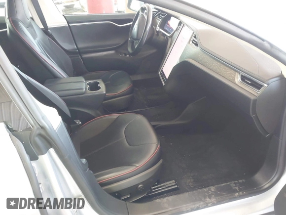 2013 Tesla Model S Performance with VIN 5YJSA1DP6DFP07999, listed as a IAAI auction lot 42284612 with 123,261 mi miles and . Bid and sale history available at DreamBid. Image 5.