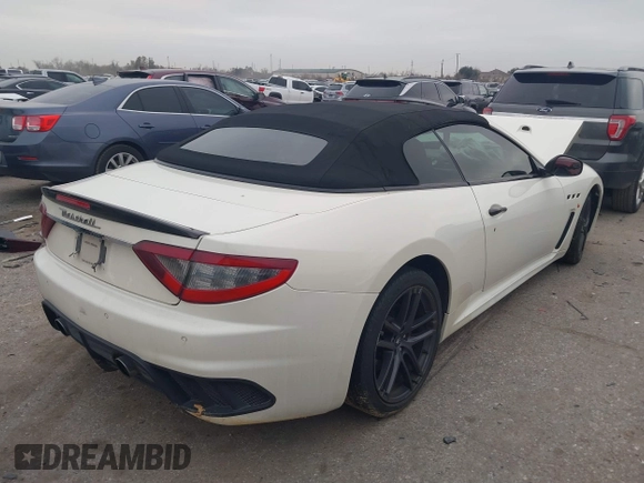 2013 Maserati GranTurismo Convertible Sport with VIN ZAM45VMA9D0070293, listed as a IAAI auction lot 41241020 with 69,156 mi miles. Bid and sale history available at carsss.com. Image 4.