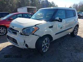 2012 Kia Soul + with VIN KNDJT2A62C7371120, listed as a IAAI auction lot 41442500 with 152,206 mi miles. Bid and sale history available at carsss.com. Image 2.