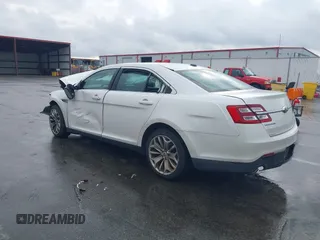 2014 Ford Taurus Limited with VIN 1FAHP2F80EG183153, listed as a IAAI auction lot 40860378 with 163,294 mi miles. Bid and sale history available at carsss.com. Image 3.