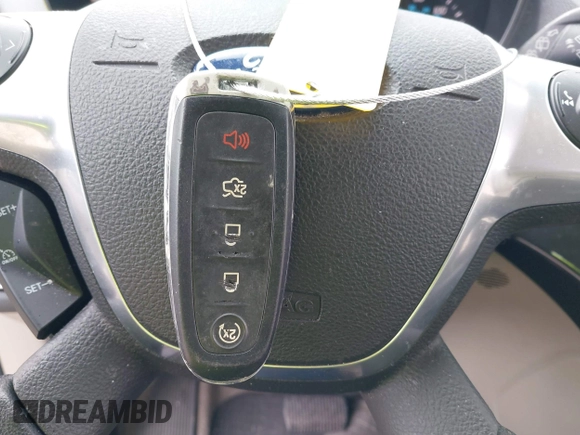 2016 Ford Escape Titanium with VIN 1FMCU9JX2GUA89716, listed as a IAAI auction lot 41899786 with 85,474 mi miles and . Bid and sale history available at DreamBid. Image 11.