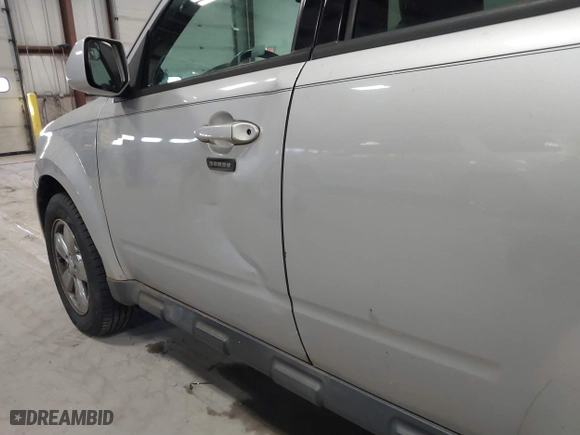 2011 Ford Escape Limited with VIN 1FMCU0EG7BKA43387, listed as a IAAI auction lot 41897571 with 224,780 mi miles. Bid and sale history available at carsss.com. Image 12.