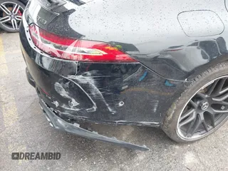 2022 Mercedes-Benz AMG GT 43 z VIN W1K7X5KB7NA048401, wystawiony jako IAAI lot #41805470 z przebiegiem 118 033 mil mil oraz . Historia ofert i sprzedaży dostępna na DreamBid. Obrazek 19.