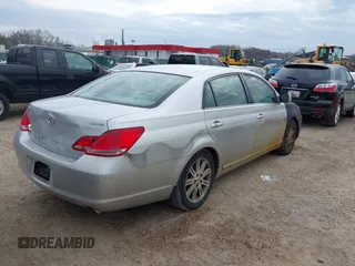 2007 Toyota Avalon XL with VIN 4T1BK36B57U174223, listed as a IAAI auction lot 41910541 with 220,304 mi miles. Bid and sale history available at carsss.com. Image 4.