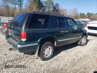 1997 GMC Jimmy SL with VIN 1GKCS13W2V2518446, listed as a Copart auction lot 86629634 with 183,089 mi miles and Salvage Title. Bid and sale history available at carsss.com. Image 3.