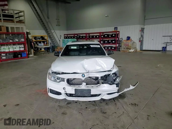 2014 BMW 4 Series 435i with VIN WBA3R1C52EK192076, listed as a Copart auction lot 60098595 with 89,504 mi miles and Salvage title. Bid and sale history available at DreamBid. Image 13.