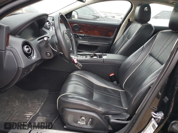 2017 Jaguar XJ R-Sport with VIN SAJWA1C77H8W04956, listed as a Copart auction lot 45174505 with 142,002 mi miles and Salvage title. Bid and sale history available at DreamBid. Image 7.