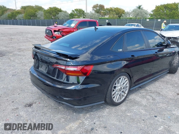 2019 Volkswagen Jetta GLI S with VIN 3VW5T7BU9KM142379, listed as a IAAI auction lot 42056617 with 77,283 mi miles and . Bid and sale history available at DreamBid. Image 4.